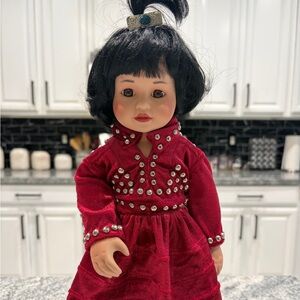 Charming Red Doll with Black Hair